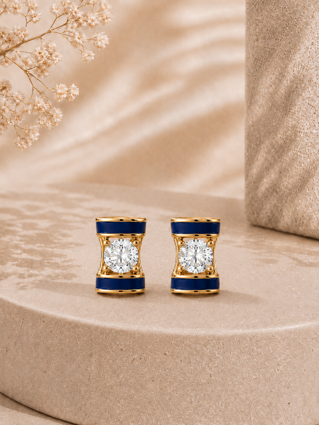 9K gold kite solitaire diamond earrings by Oré