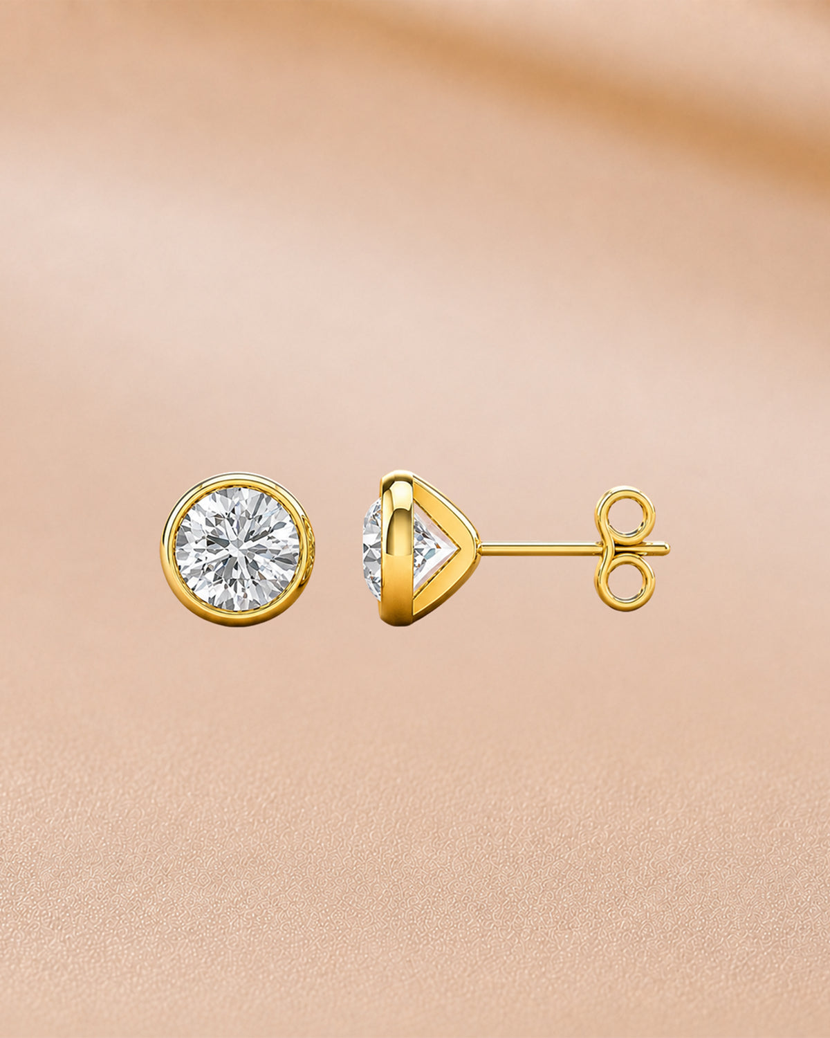 9K yellow gold 1.00 ct round bezel-set solitaire stud earrings by Oré