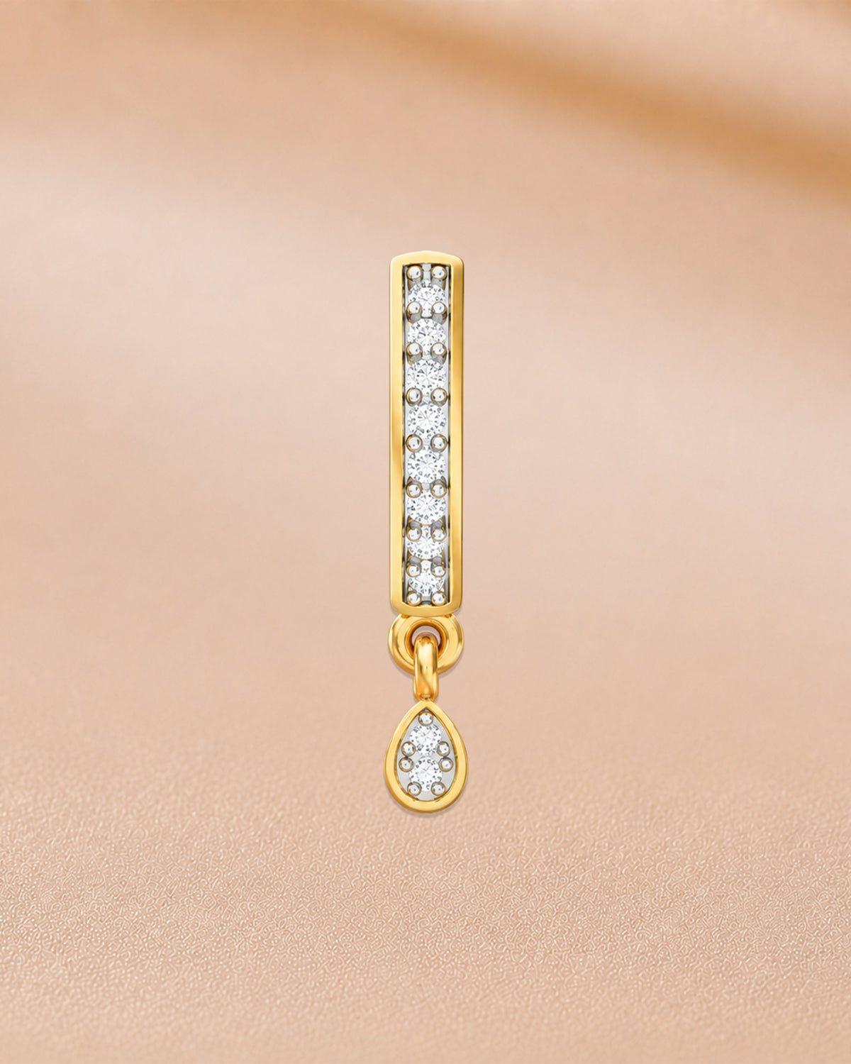 14K yellow gold solitaire circular pendant nose pin by Oré