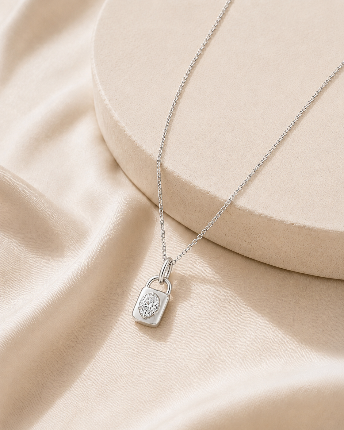 18K gold rectangular halo diamond pendant by Oré