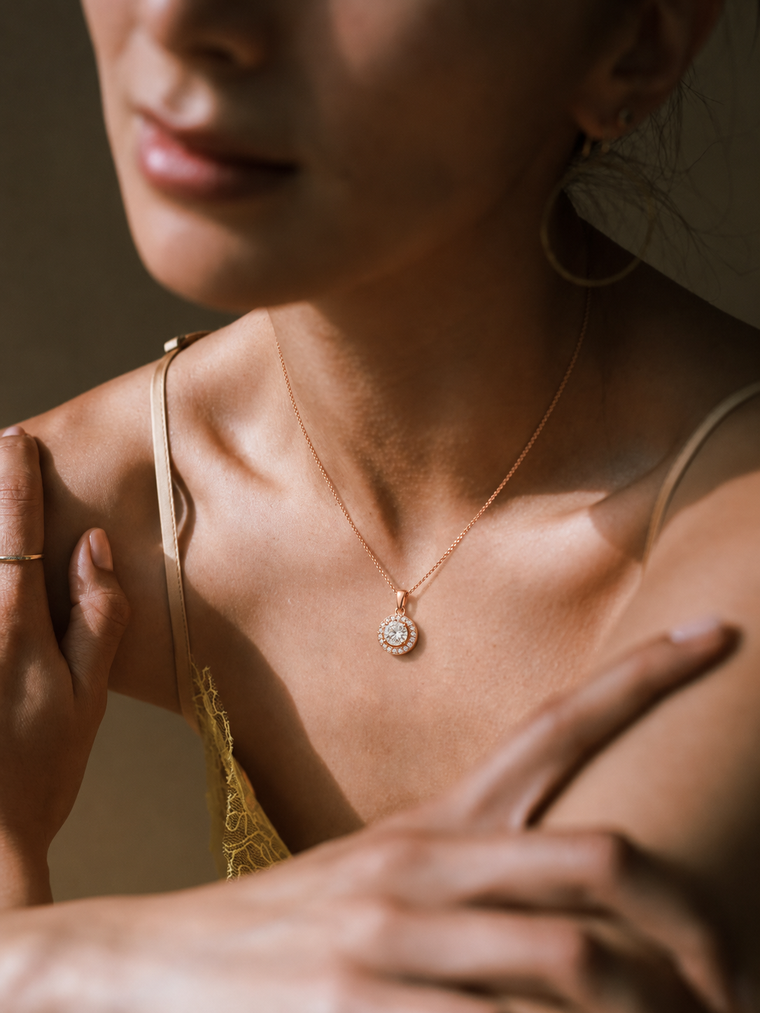 9K gold round halo diamond pendant by Oré, view 2