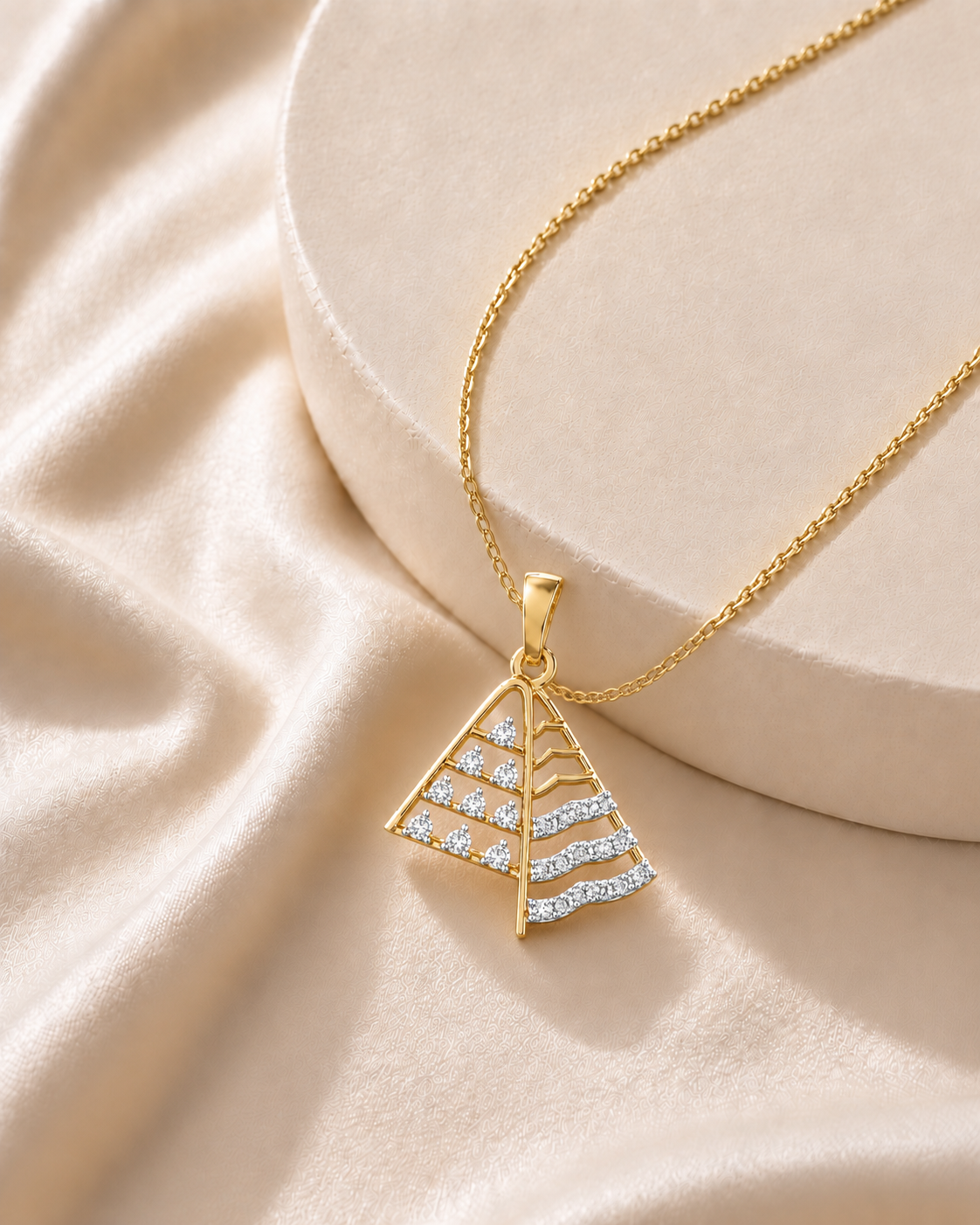 14K gold geometric tiered diamond pendant by Oré