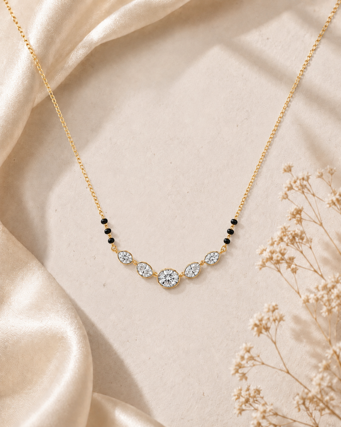 14K gold graduated diamond necklace by Oré