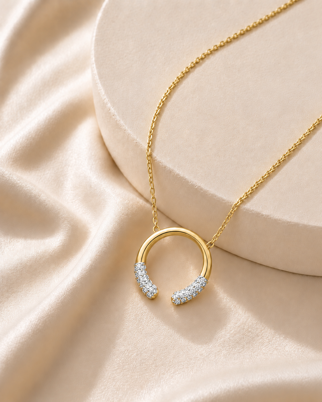 14K gold open circle diamond pendant by Oré