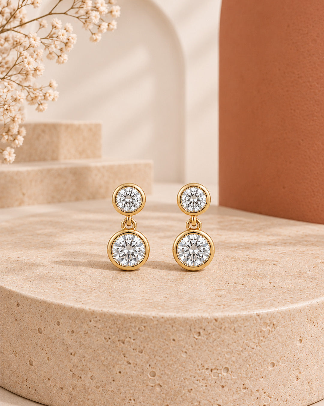 9K yellow gold double-stone diamond drop earrings by Oré