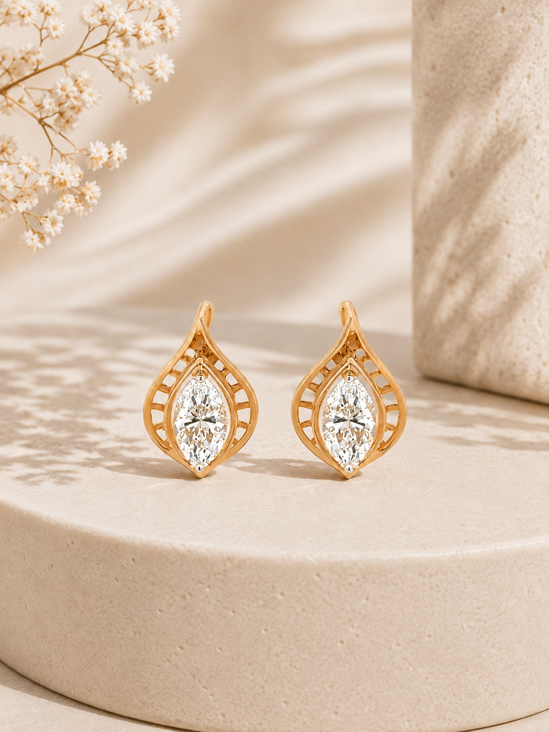 18K gold openwork leaf diamond earrings by Oré