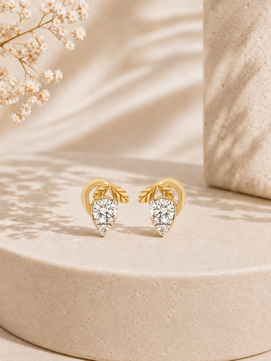 14K gold bow pear drop diamond earrings by Oré
