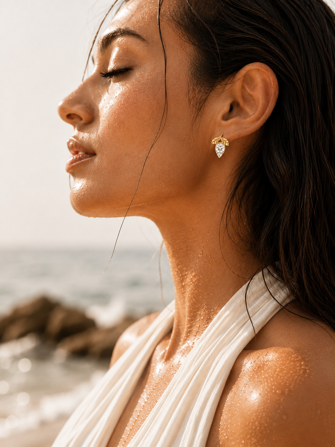 14K gold bow pear drop diamond earrings by Oré, view 2