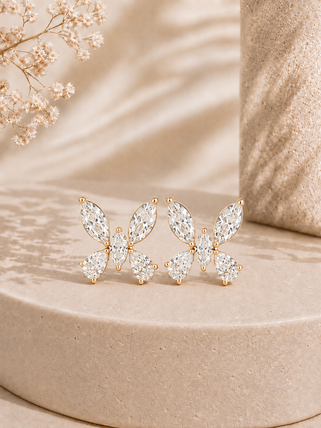 18K gold butterfly cluster diamond earrings by Oré