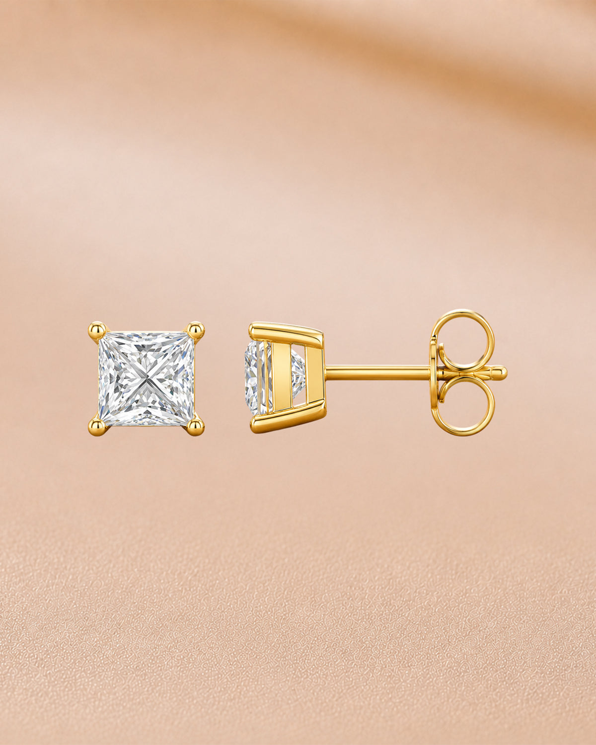 9K yellow gold 1.04 ct round bezel-set solitaire stud earrings by Oré
