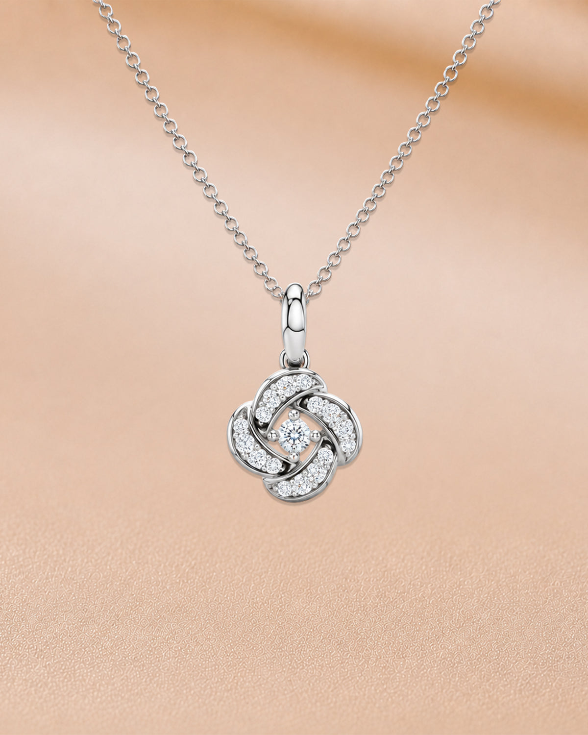 14K rose gold solitaire flower pendant with chain by Oré