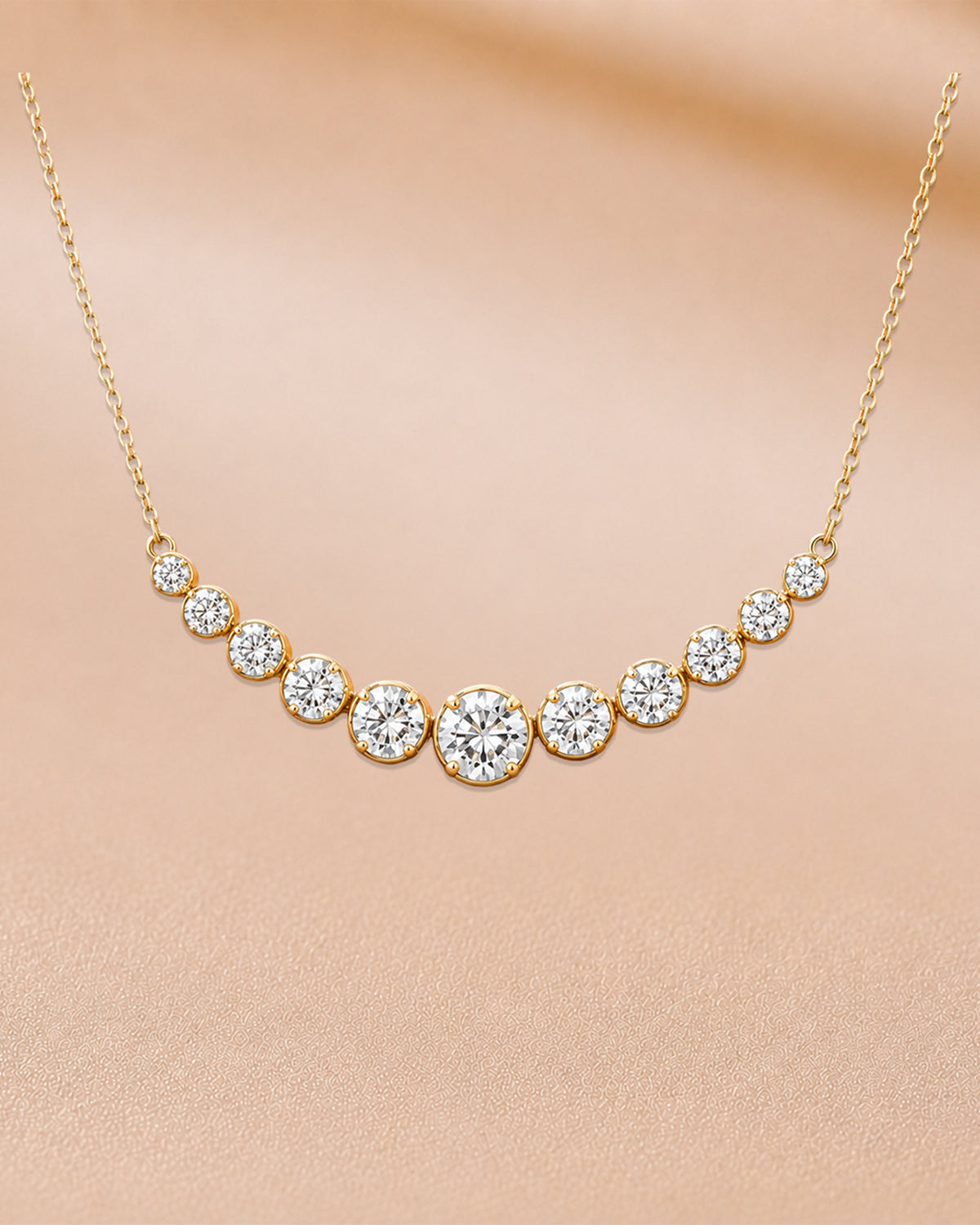 9K yellow gold graduated diamond bar necklace by Oré