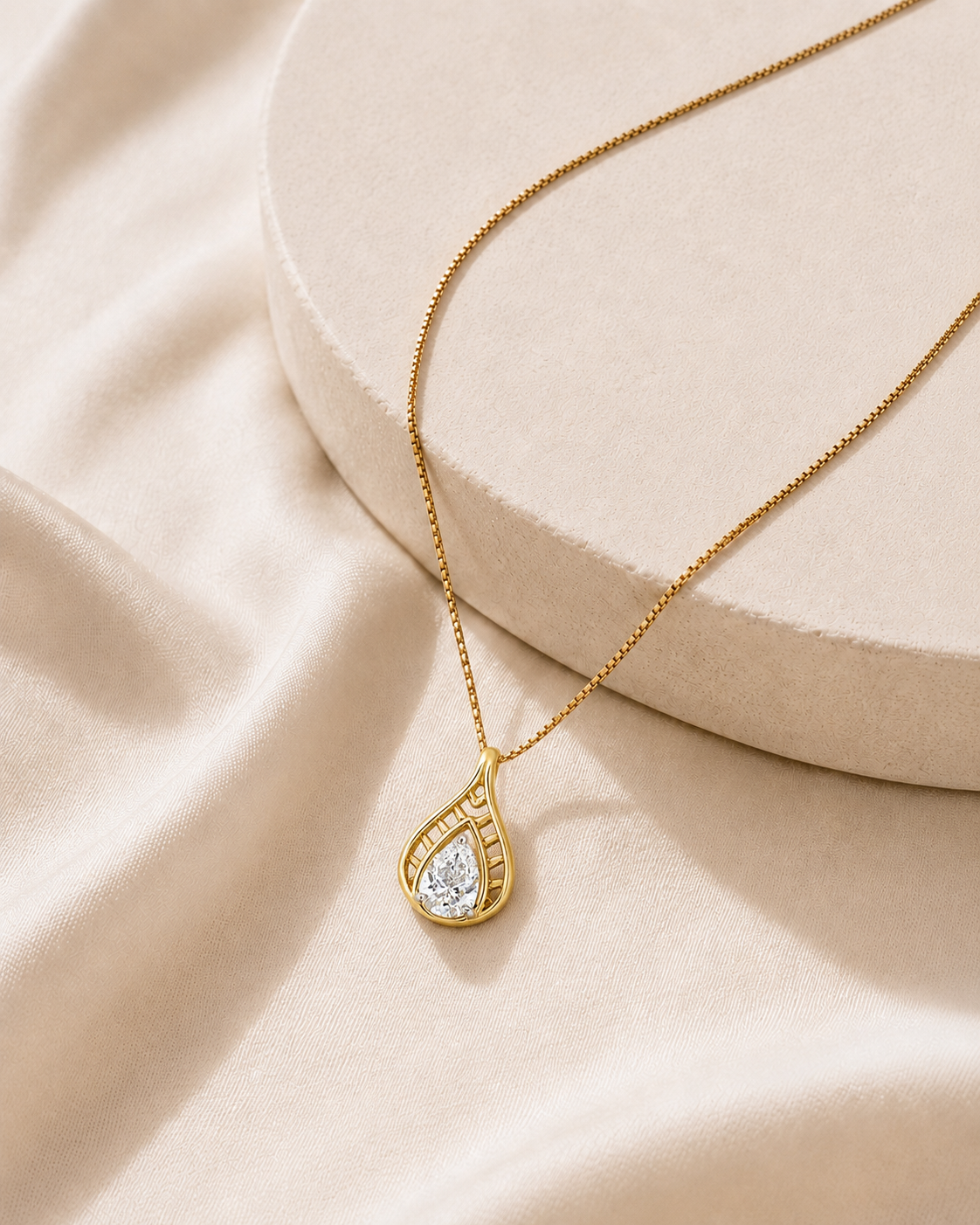 18K gold openwork pear diamond pendant by Oré