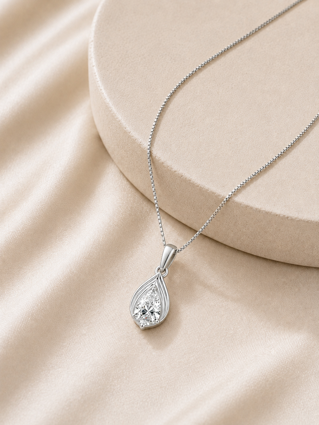 14K gold pear solitaire diamond pendant by Oré