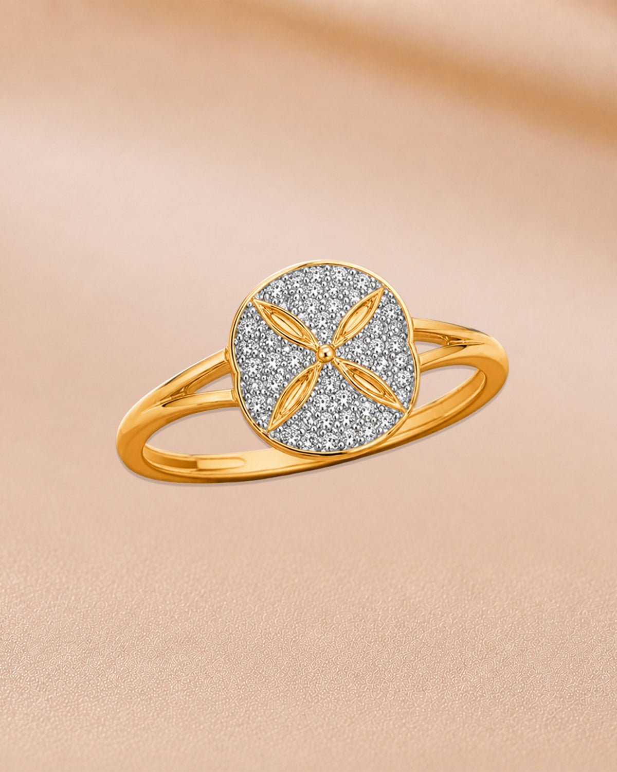 9K yellow gold circular diamond halo ring by Oré