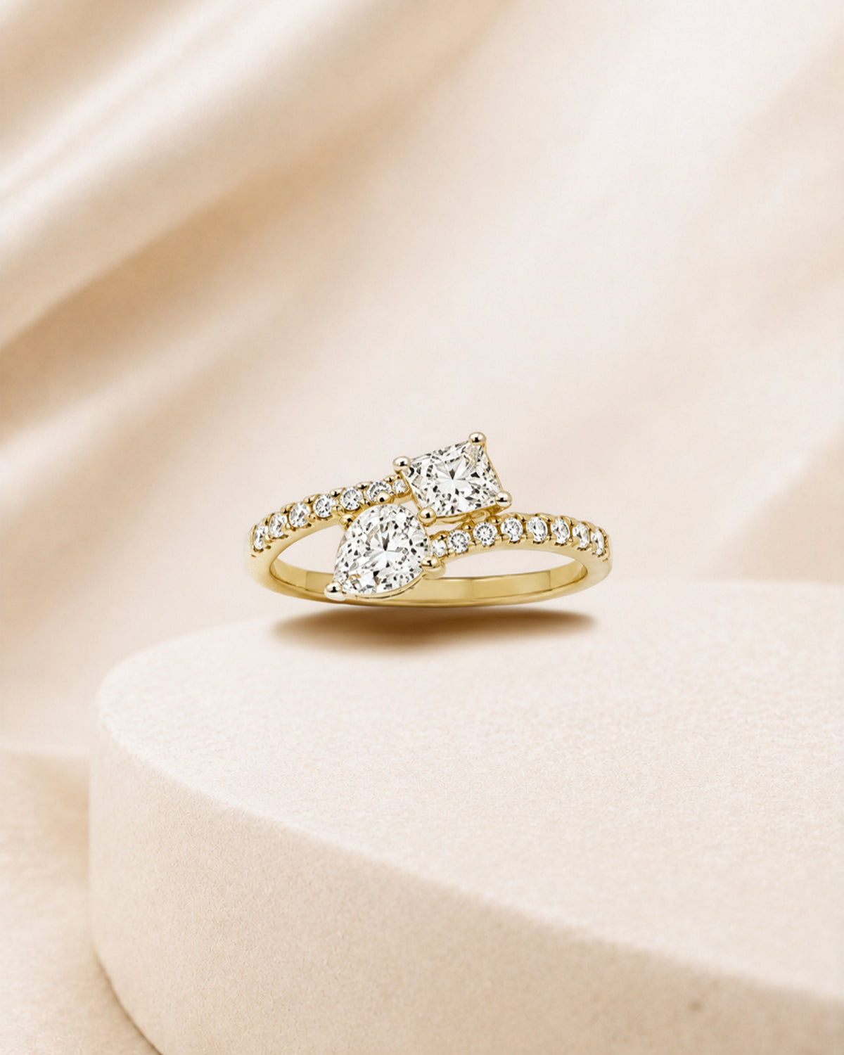 18K gold twist solitaire diamond ring by Oré