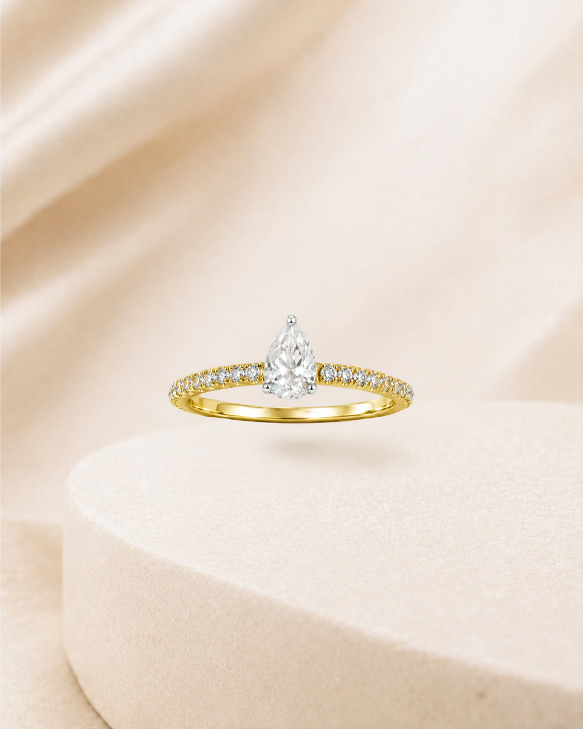 18K gold pear solitaire diamond ring by Oré