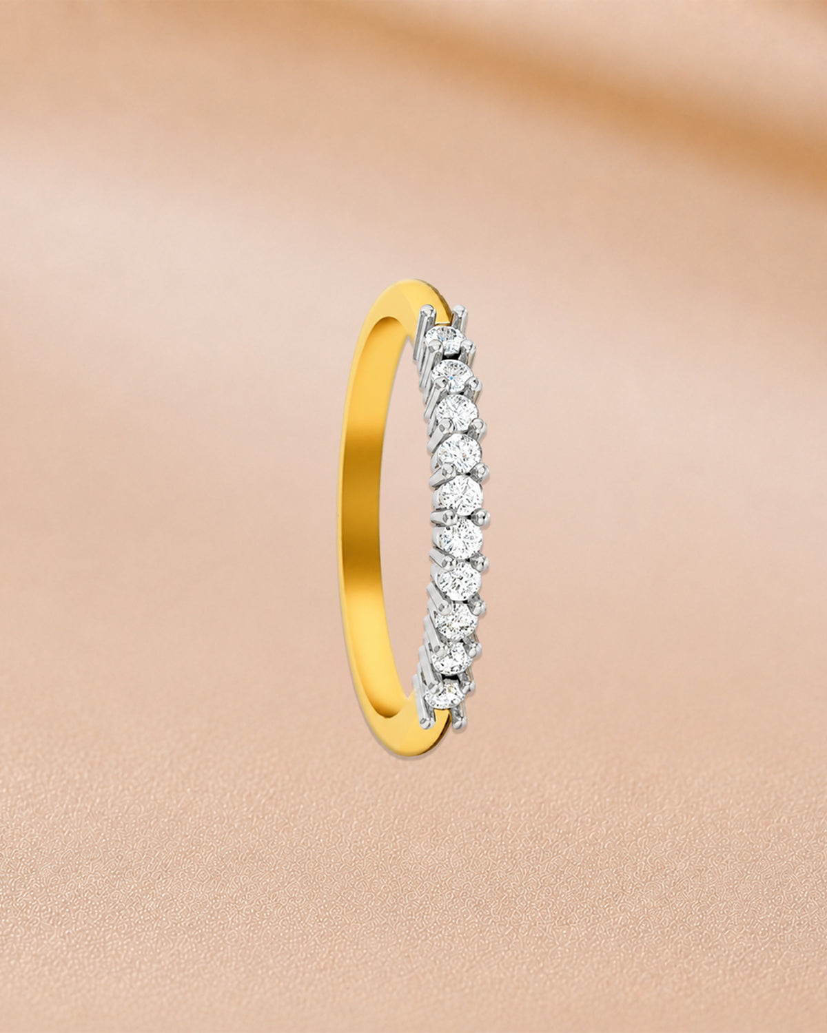 Round diamond half eternity ring in 14K yellow gold by Oré