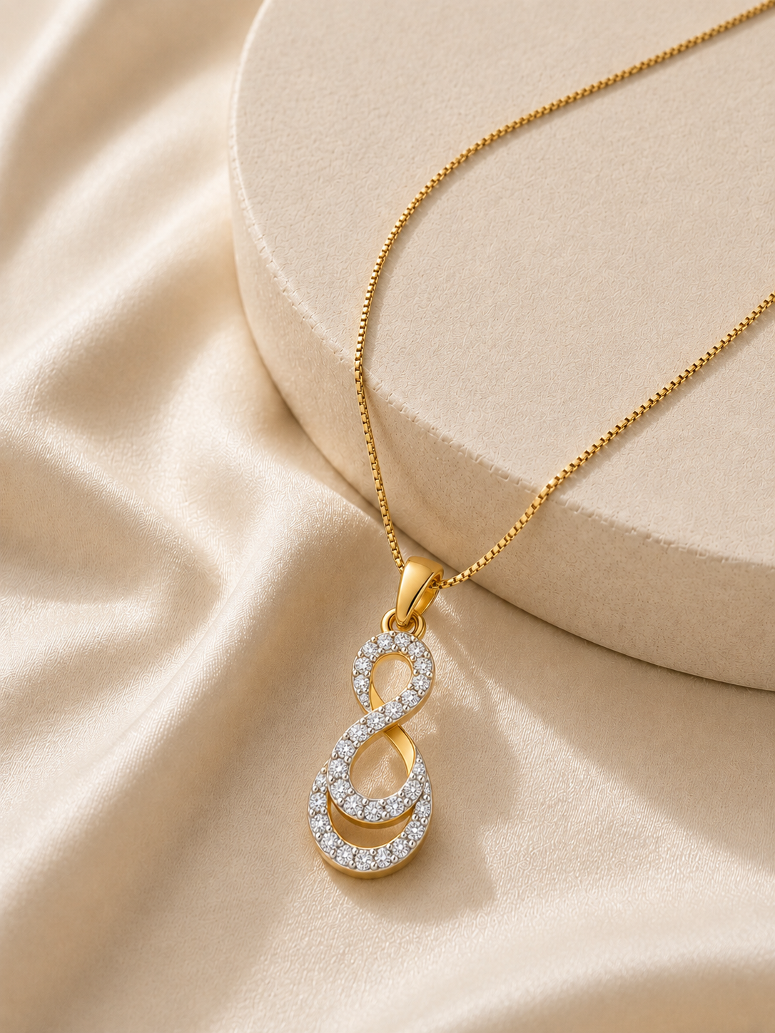 9K gold double teardrop diamond pendant by Oré