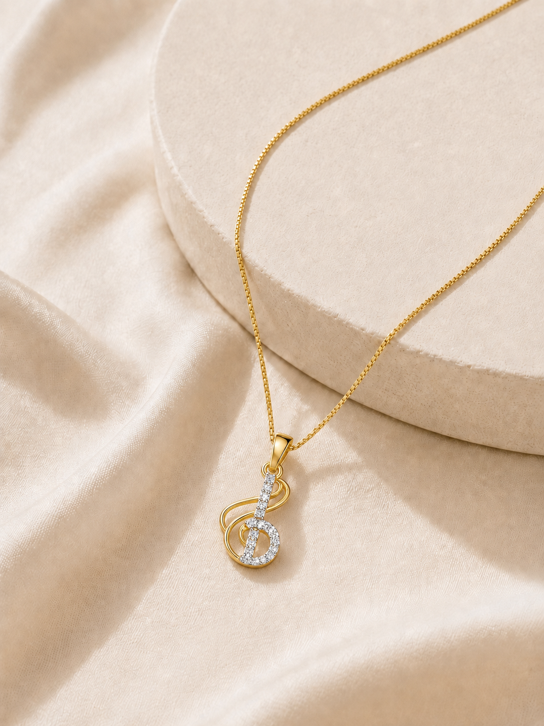 9K gold musical note diamond pendant by Oré